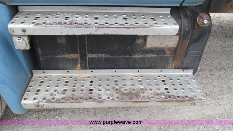 image for item I3114 1998 Freightliner FL70 Business Class fuel truck