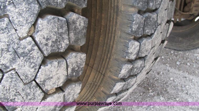 image for item I3114 1998 Freightliner FL70 Business Class fuel truck