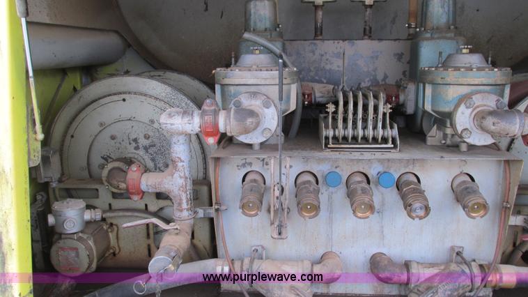 image for item I3114 1998 Freightliner FL70 Business Class fuel truck