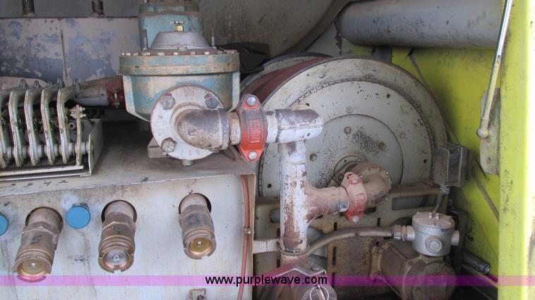 image for item I3114 1998 Freightliner FL70 Business Class fuel truck