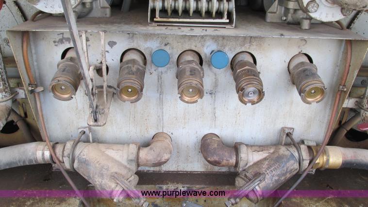 image for item I3114 1998 Freightliner FL70 Business Class fuel truck