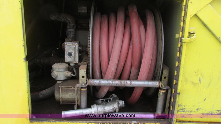 image for item I3114 1998 Freightliner FL70 Business Class fuel truck