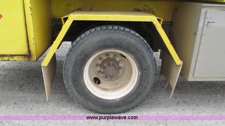 image for item I3114 1998 Freightliner FL70 Business Class fuel truck