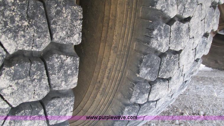 image for item I3114 1998 Freightliner FL70 Business Class fuel truck