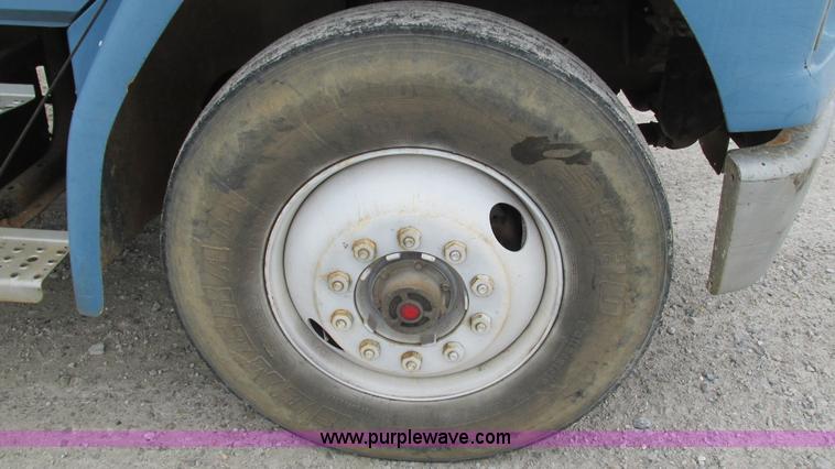 image for item I3114 1998 Freightliner FL70 Business Class fuel truck