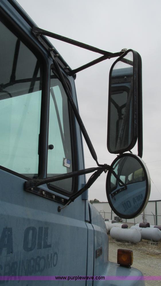 image for item I3114 1998 Freightliner FL70 Business Class fuel truck