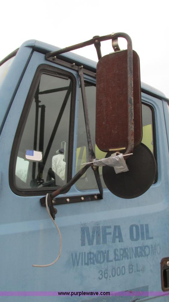 image for item I3114 1998 Freightliner FL70 Business Class fuel truck