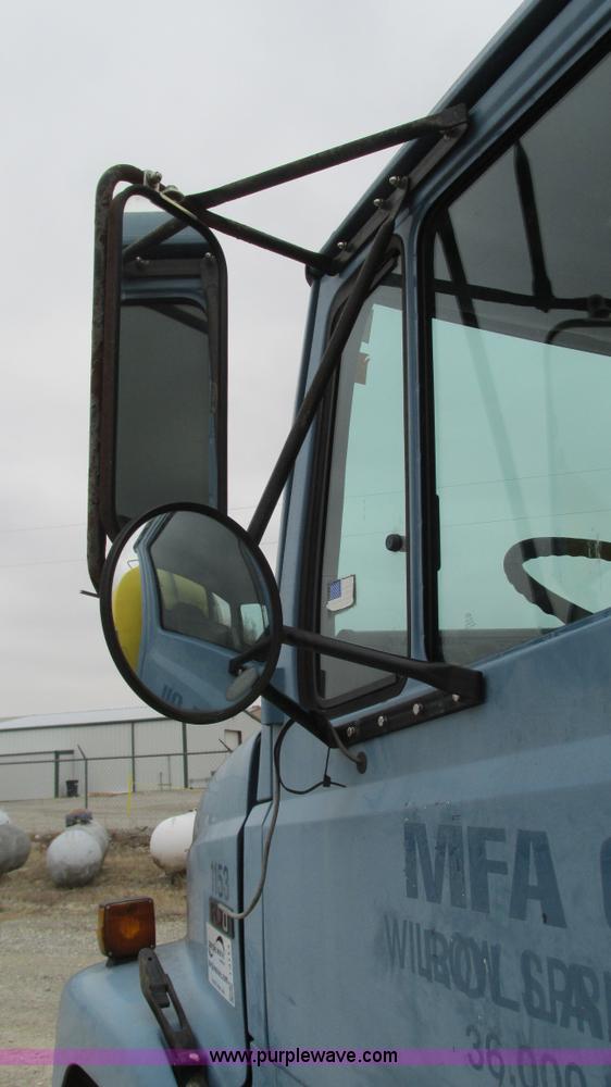 image for item I3114 1998 Freightliner FL70 Business Class fuel truck