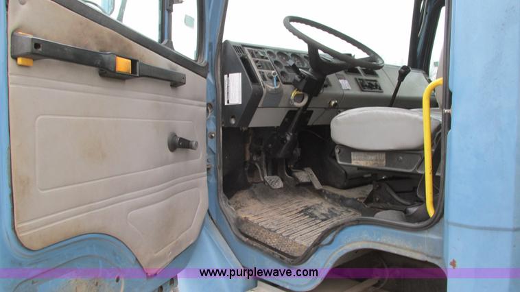 image for item I3114 1998 Freightliner FL70 Business Class fuel truck