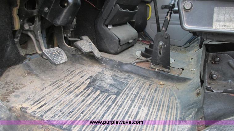 image for item I3114 1998 Freightliner FL70 Business Class fuel truck