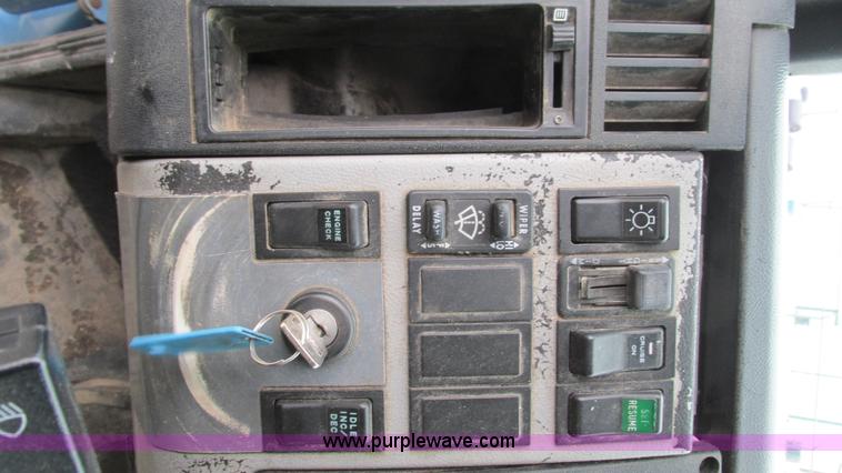 image for item I3114 1998 Freightliner FL70 Business Class fuel truck