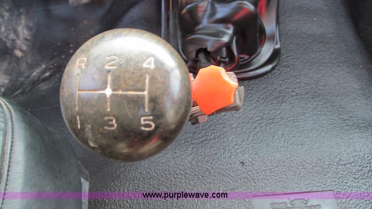 image for item I3116 1990 Ford F700 semi truck