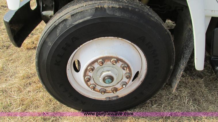 image for item I3119 1986 International 1954 flatbed truck