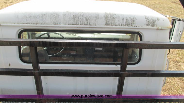 image for item I3119 1986 International 1954 flatbed truck