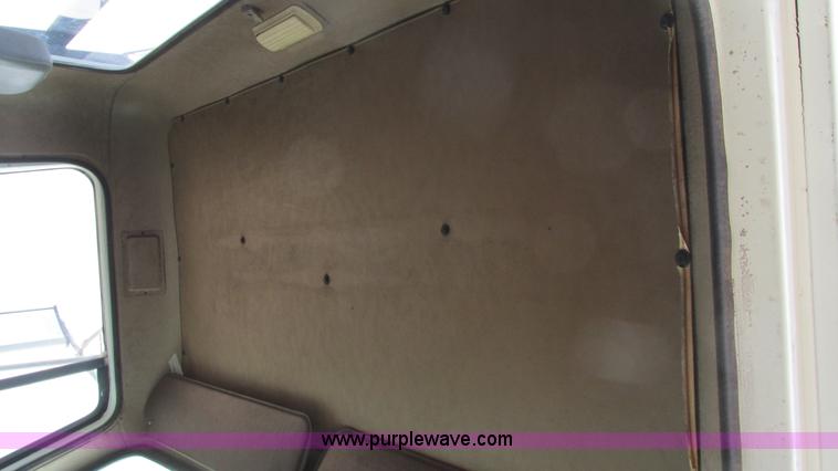 image for item I3119 1986 International 1954 flatbed truck