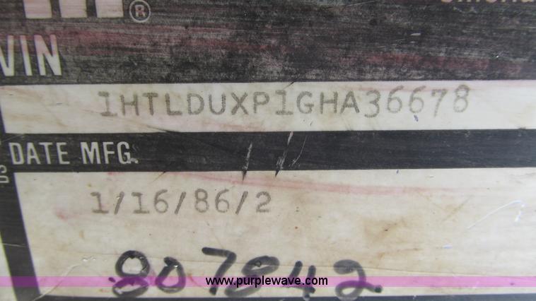 image for item I3119 1986 International 1954 flatbed truck