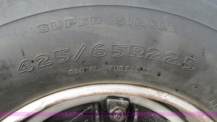 image for item I3120 1987 Mack DM686S flatbed truck