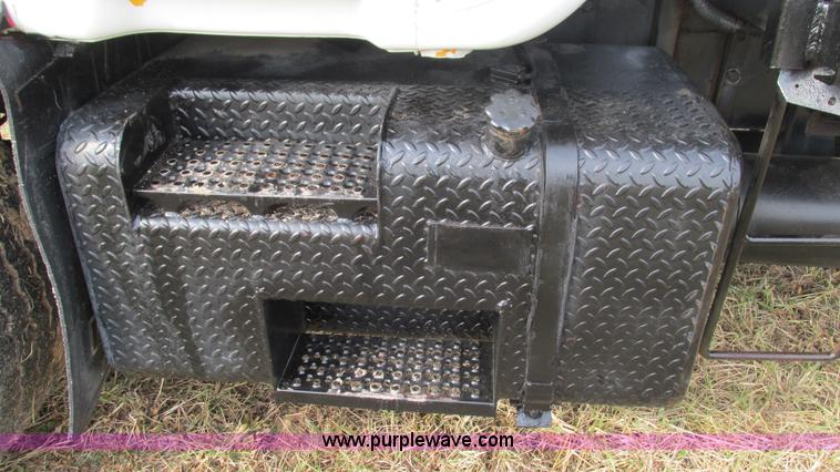 image for item I3120 1987 Mack DM686S flatbed truck