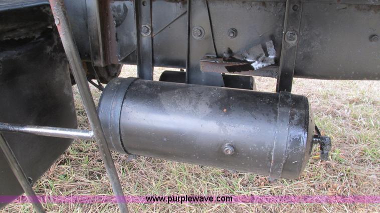 image for item I3120 1987 Mack DM686S flatbed truck