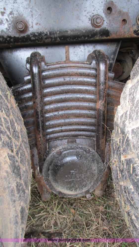 image for item I3120 1987 Mack DM686S flatbed truck