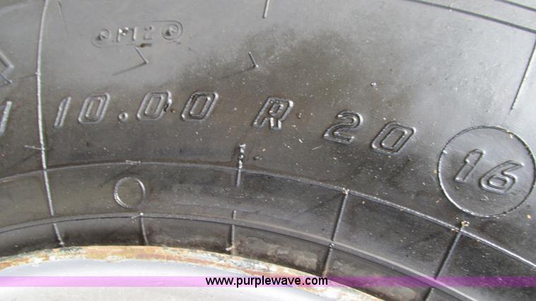 image for item I3120 1987 Mack DM686S flatbed truck