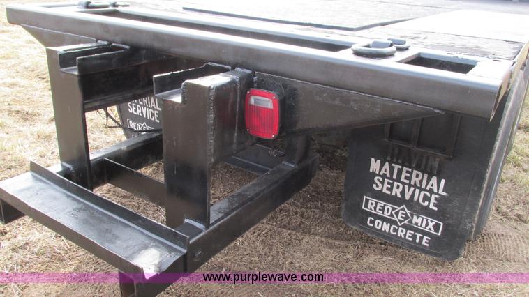 image for item I3120 1987 Mack DM686S flatbed truck