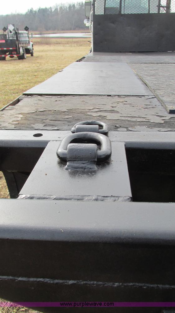 image for item I3120 1987 Mack DM686S flatbed truck