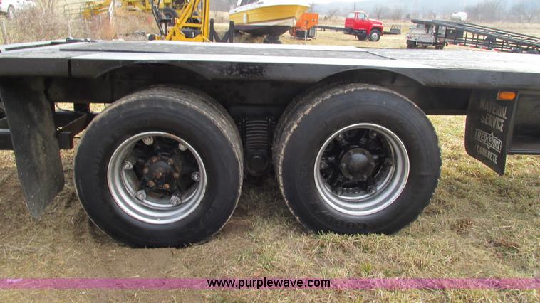 image for item I3120 1987 Mack DM686S flatbed truck