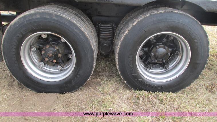 image for item I3120 1987 Mack DM686S flatbed truck