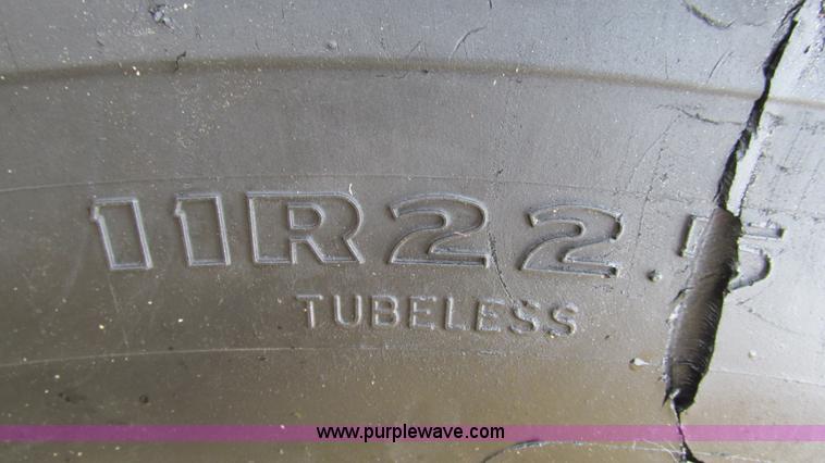 image for item I3120 1987 Mack DM686S flatbed truck