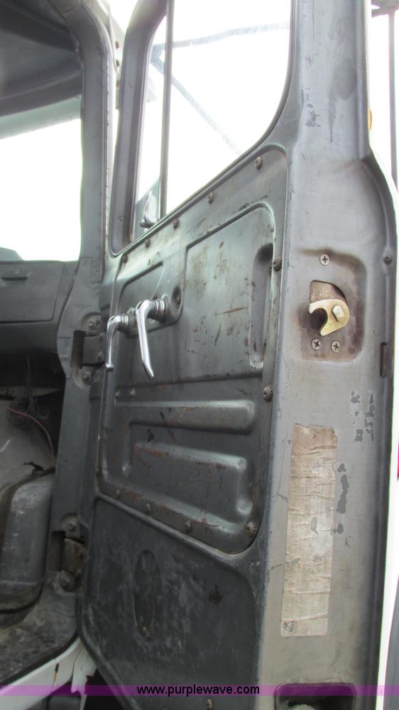 image for item I3120 1987 Mack DM686S flatbed truck