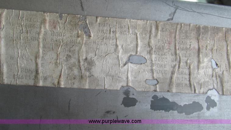 image for item I3120 1987 Mack DM686S flatbed truck