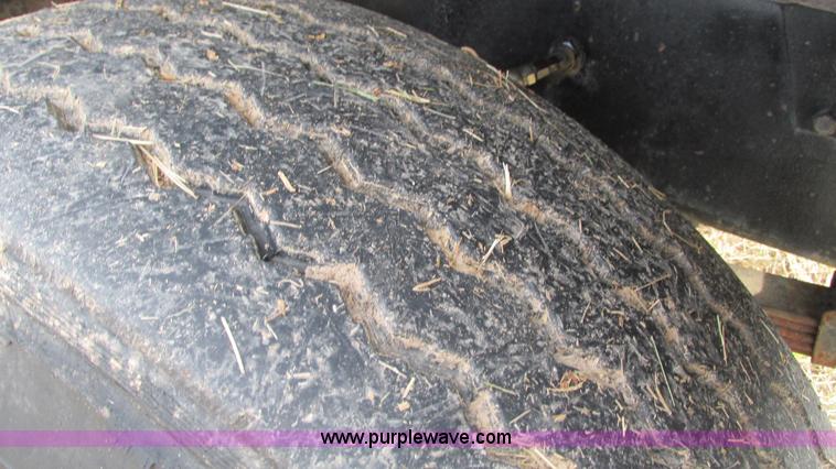 image for item I3120 1987 Mack DM686S flatbed truck