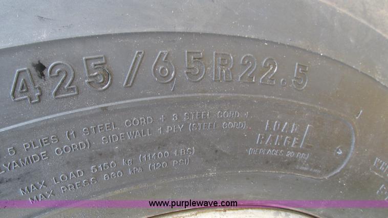 image for item I3120 1987 Mack DM686S flatbed truck