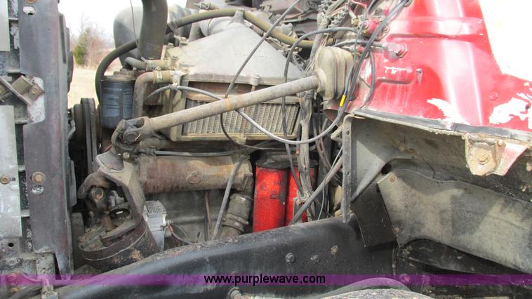 image for item I3120 1987 Mack DM686S flatbed truck