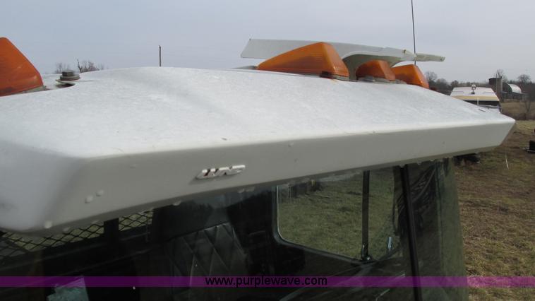 image for item I3120 1987 Mack DM686S flatbed truck