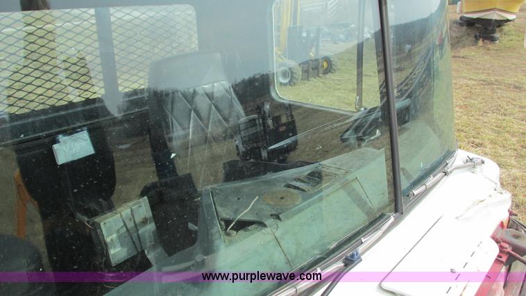 image for item I3120 1987 Mack DM686S flatbed truck