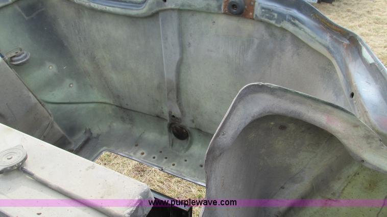 image for item I3120 1987 Mack DM686S flatbed truck