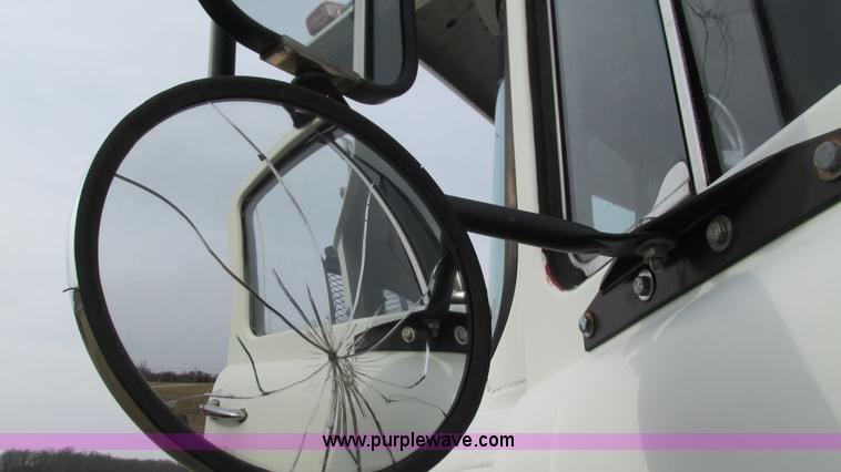 image for item I3120 1987 Mack DM686S flatbed truck