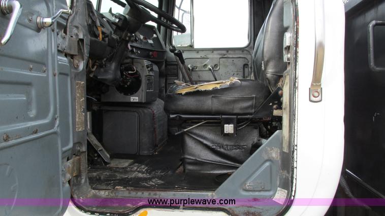 image for item I3120 1987 Mack DM686S flatbed truck