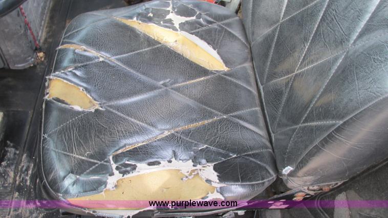 image for item I3120 1987 Mack DM686S flatbed truck