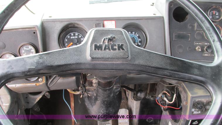 image for item I3120 1987 Mack DM686S flatbed truck