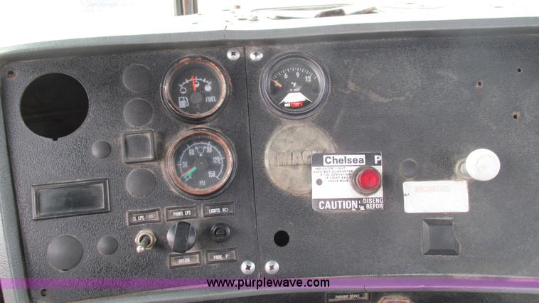 image for item I3120 1987 Mack DM686S flatbed truck