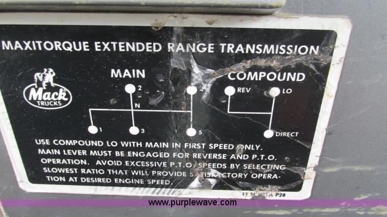 image for item I3120 1987 Mack DM686S flatbed truck