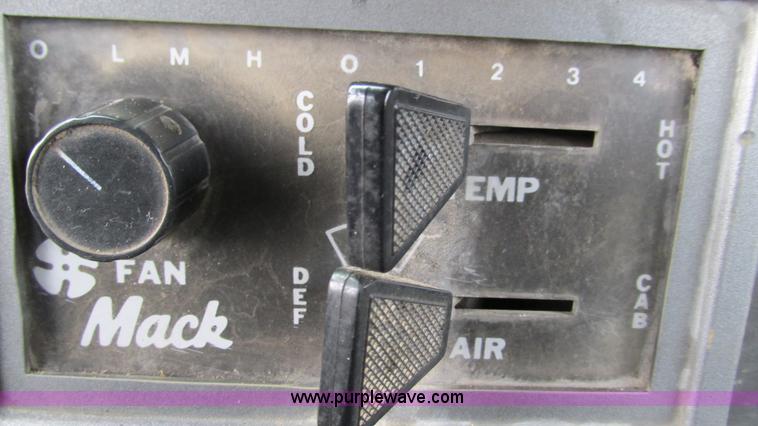 image for item I3120 1987 Mack DM686S flatbed truck