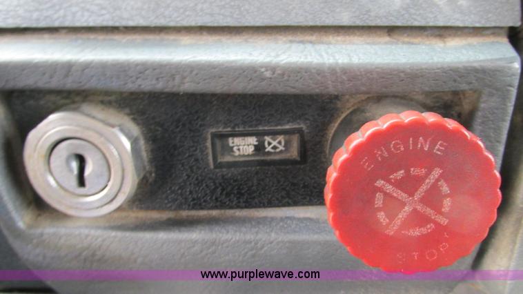 image for item I3120 1987 Mack DM686S flatbed truck