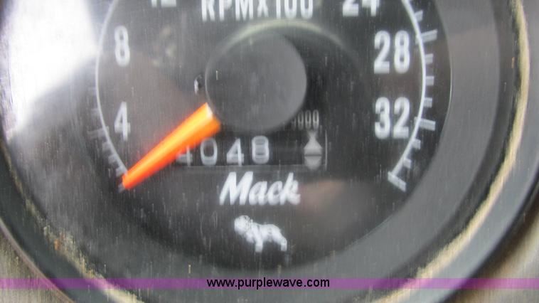 image for item I3120 1987 Mack DM686S flatbed truck