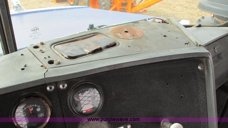 image for item I3120 1987 Mack DM686S flatbed truck