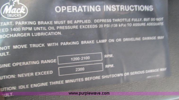 image for item I3120 1987 Mack DM686S flatbed truck