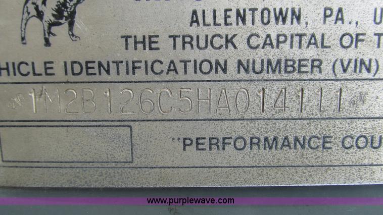 image for item I3120 1987 Mack DM686S flatbed truck